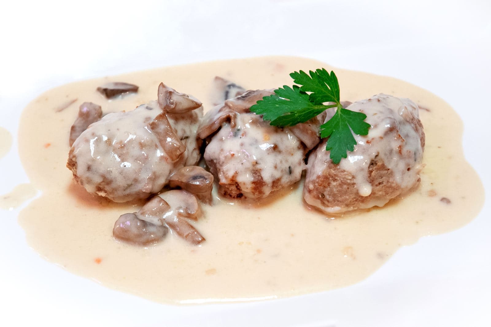 Meat balls with mushroom sauce
